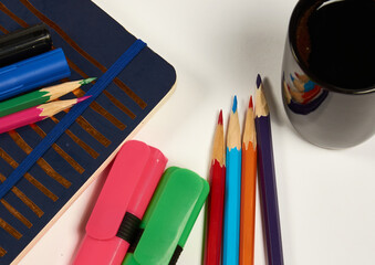 multicolored pencils on white background