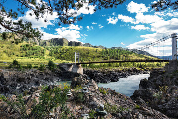 Mountain landscape with a bridge over the Katun river. Altai republic