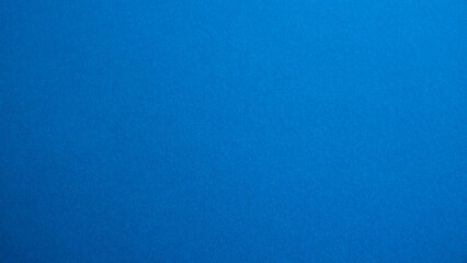 Blue matte suede fabric background, close-up. Velvety texture