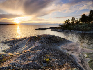 Island shore on lake Ladoga. Summer landscape. Wild nature