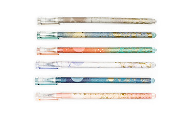 pens in various colors and patterns on a white background