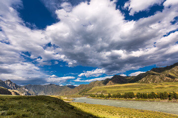 Fototapeta na wymiar Mountain landscape with river and clouds. altai republic