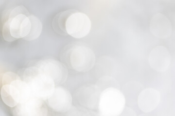 Abstract blurred silver bokeh soft light background and texture. Christmas and Happy new year on...