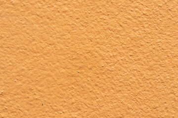 Empty orange cement wall background and texture. Beautiful Orange Advertising Backdrop.
