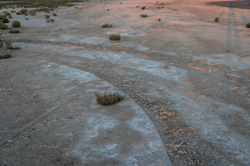dry bottom of the reservoir. soil erosion. the water's gone. the bottom of the lake. a desert instead of a reservoir.