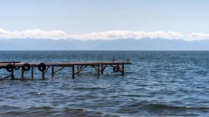 Empty pier on lake Baikal, Listvyanka, Russia.