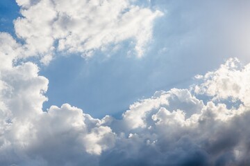 Naklejka na ściany i meble Scenic sky background. Blue sky with fluffy white clouds