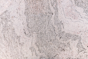 Textured pink stone background
