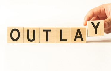 Word outlay. Wooden small cubes with letters isolated on white background with copy space available.Business Concept image.
