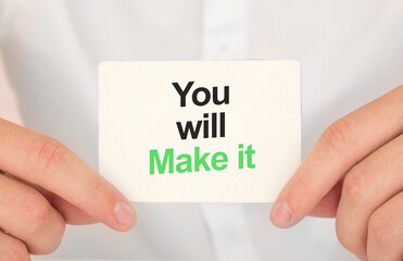 Man's hands take a card with words You will make it finance and business concept.