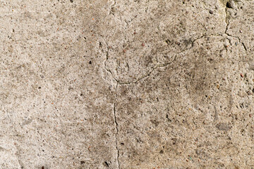A very old concrete wall is a decorative or textured surface. Can be used as a background or for design purposes