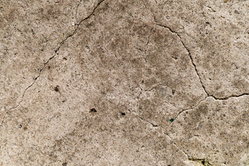 A very old concrete wall is a decorative or textured surface. Can be used as a background or for design purposes