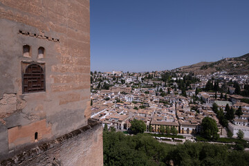 Interior and exterior of the historical building Alhambra, in Granada, Spain in a sunny day in 2020.