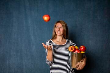 young woman with apples
