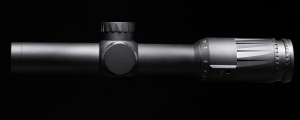 Rifle scope on a dark background