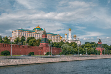 Kremlin embankment on a summer day. Towers Of The Moscow Kremlin. Bell Tower Of Ivan The Great....
