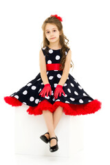 Portrait of Pretty Girl Wearing Retro Style Polka Dot Dress