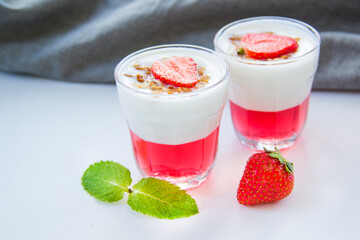 Italian dessert panna cotta with strawberries