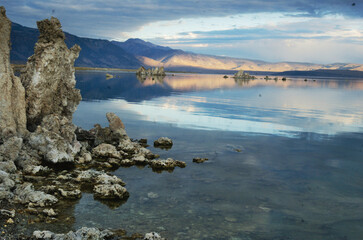 Mono lake and tufa in the foreground and view northwestern at Serra Nevada mountain range nd stormy...
