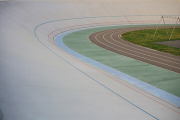 Professional outdoor cycling track at the stadium - obrazy, fototapety, plakaty