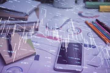 Double exposure of forex chart drawing and cell phone background. Concept of financial data analysis