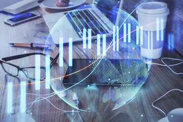 Double exposure of forex chart drawing and cell phone background. Concept of financial trading