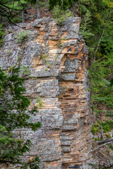Side of a rocky cliff in a canyon