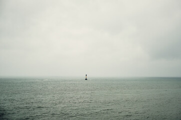 Lone Lighthouse on a Cloudy Day