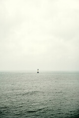 Lone Buoy on a Cloudy Day