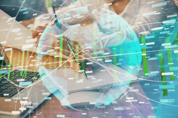 Double exposure of business theme drawing over people taking notes background. Concept of financial world