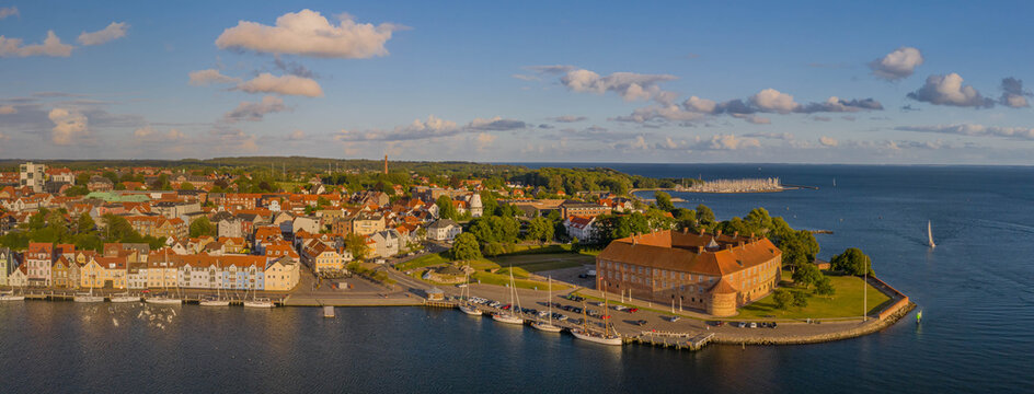 Panoramic aerial view of of the harbor and castle in Sonderborg Jutland, Denmark, Europe. Panorama view of old town and colorful old houses in the harbor of Sonderborg.
