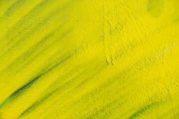 Watercolour plaster background in old vintage yellow paint with strokes