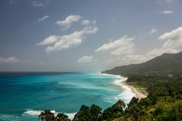 Obraz premium Aerial drone panoramic view of paradise beach and green mountains in Barahona, Dominican Republic 