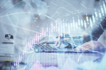 Multi exposure of woman hands typing on computer and financial chart hologram drawing. Stock market analysis concept.