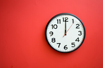 Wall Clock on a Red Background