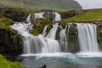 Fototapeta premium Kirkjufellsfoss waterfall in Snaefellsnes peninsula in Iceland