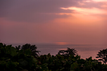 Fototapeta na wymiar The beautiful landscape of sunset ocean background orange color sky.