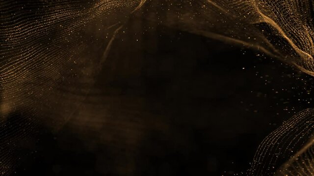 golden waves motion abstract of particles gold dust with stars on black background. wave background gold movement, seamless loop in 4k resolution.
