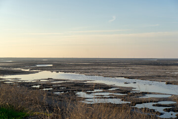 Wooden fence on a field / Sunset on the beach / sunset over the river