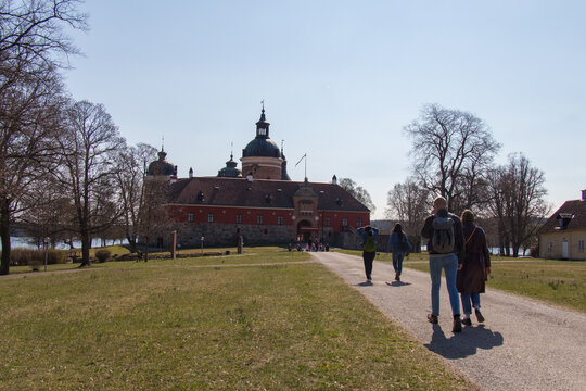 Mariefred, Sweden - April 20 2019: the view of people walking towards Gripsholm Castle on April 20 2019 in Mariefred, Sweden.