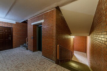 Fototapeta premium Russia, Moscow- February 15, 2020: interior public place, house entrance. doors, walls, staircase corridors