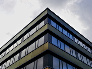 Fragment of an office building against the sky.
