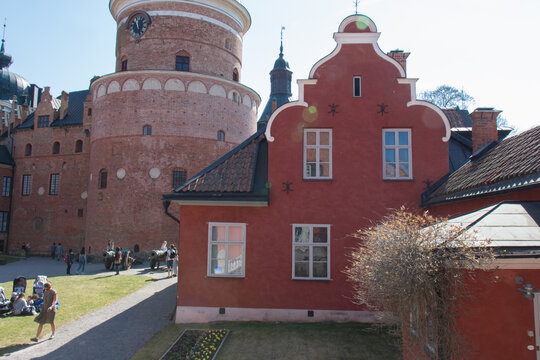 Mariefred, Sweden - April 20 2019: the view of tourists in the interior courtyard of Gripsholm Castle on April 20 2019 in Mariefred, Sweden.