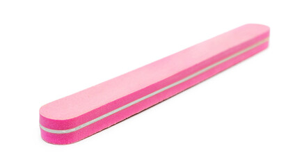 Pink nail file isolated on white.