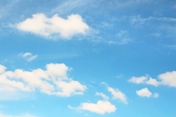 Naklejka na ściany i meble Blue sky with soft white clouds background, beautiful and bright summer skies.