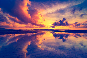 Thailand ocean sunrise silhouette aerial: mountain island on sea bay waterfront reflection romantic...