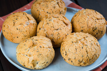a plate of Japanese mochi bread with black sesame 