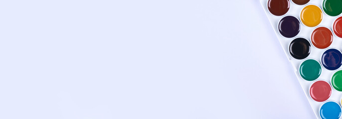 Watercolor paint white background. Flat lay, overhead view image. Copy space, template.