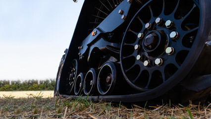 Close up of rubber tracked tractor