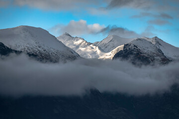 Snow mountain landscape with clouds. Queenstown, New Zealand
